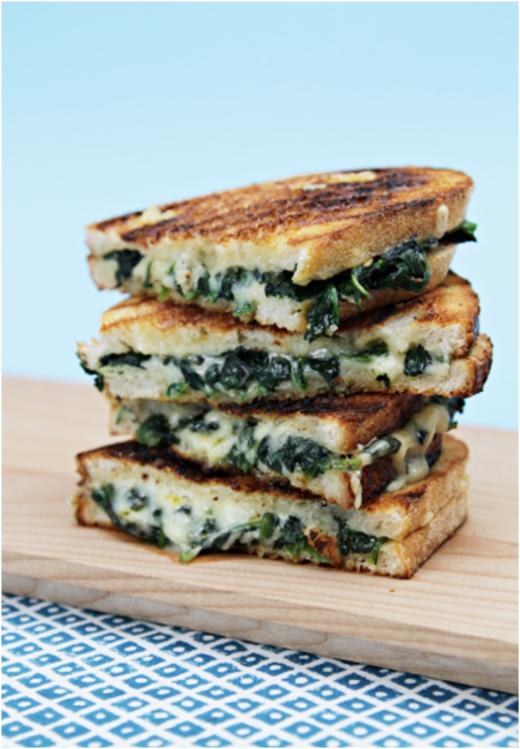 Grilled cheese sandwiches with wilted spinach and Emmental